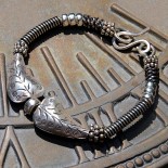 sterling silver bracelet with Thai leaf beads, sterling coils, Sterling silver brangle bracelet by Leslie Stewart of Art by LK Stewart Bend OR Sunriver OR